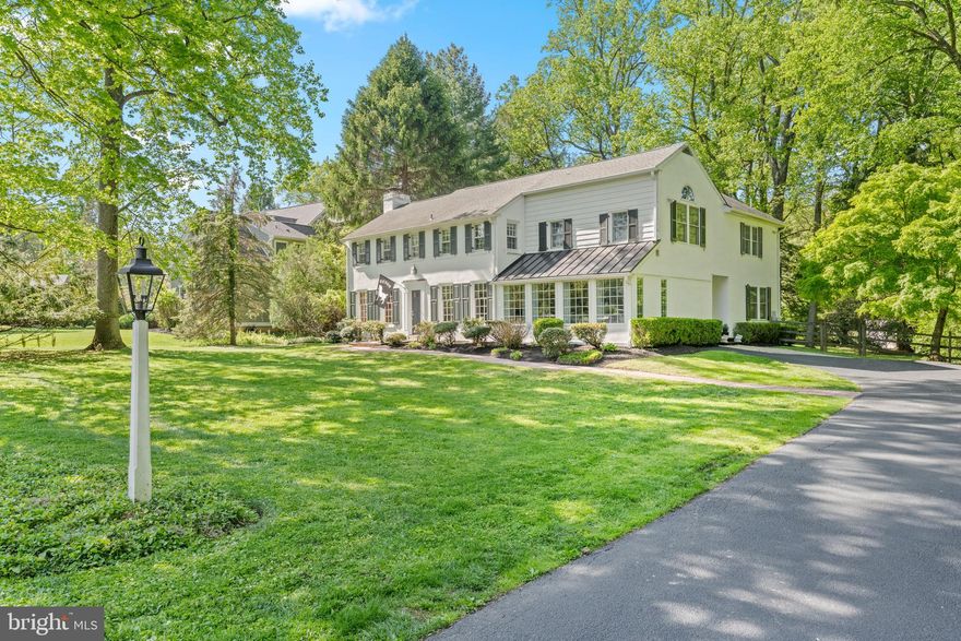 Welcome to 213 Spencer Road , a home that truly captures your attention from the moment you arrive. Built in 1930 by renowned architect Walter Off, this timeless Colonial is one people often slow down to admire and for good reason. It’s a home that feels special the second you see it. Located in the award-winning Tredyffrin-Easttown School District, this beautifully expanded home offers over 4,000 square feet, featuring 5 bedrooms and 4.5 baths, with the flexibility for multiple home offices to fit today’s lifestyle. Step inside and you’ll immediately notice the timeless character and architectural details rarely found in newer homes: including hardwood floors throughout, a welcoming living room with custom built-ins and a classic wood-burning fireplace, and a spacious dining room made for gatherings and celebrations. At the heart of the home is the updated kitchen, which opens into a step-down family room with cathedral ceilings, custom built-ins, and a gas fireplace , filled with natural light and designed for everyday living and connection. French doors open to a flat, private, fenced-in backyard with a patio, creating the perfect space for entertaining, relaxing, and everyday outdoor living. A bright and spacious bonus room, framed by four large picture windows with plantation shutters, creates the perfect setting for a playroom, second family room, or relaxed gathering space. A separate, private office offers a quiet, dedicated space for working from home. A first-floor bedroom, currently used as a home office, with a full bath adds even more flexibility for guests, a private workspace, or an au pair suite. Upstairs, the second floor offers four bedrooms, including a spacious primary suite with cathedral ceilings, a walk-in closet, and a beautifully enlarged and remodeled bath. A second ensuite bedroom provides added comfort and privacy, while two additional bedrooms share a well-appointed hall bath. The finished lower level creates a relaxed, inviting space perfect for movie nights, playing mahjong, or simply unwinding. This home has been lovingly maintained and expanded over the past 25 years, where the current owners raised their family and thoughtfully added significant space to enhance both comfort and functionality all while preserving the original charm that makes it so unique. And then there’s the lifestyle…This neighborhood is known for its incredible sense of community with Block parties, Holiday celebrations with Santa, Best decorated home for the holiday contest, Book clubs and wine nights. All just steps from your front door. You can walk to the Devon train station and enjoy the ease of walking to the world famous Devon Horse Show (skip the traffic and parking altogether). You’ll also love being just minutes from Devon Yards for dining at Terrain and shopping at Anthropologie. With easy access to Route 202, the PA Turnpike, Route 76, and Route 30, the location is as convenient as it is charming. This isn’t just a house… it’s a home that has been deeply loved, admired, and enjoyed. Now it’s ready for its next chapter. Come see it for yourself… you’ll understand right away.