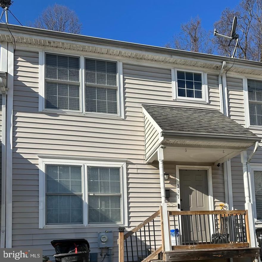 Nestled and tucked away on a cul-de-sac at the end of the street you will find this 3 bedroom 2 1/2 bath Colonial-style townhouse, built in 2005 with an open floor plan perfect for today's lifestyle.  As you enter, you are greeted by the dining room and an open floor plan that enhances the flow of natural light throughout the main living areas.  The galley kitchen features a tiled floor and a breakfast bar with seating for three which flows seemlessly into the spacious living area with sliders to the private deck overlooking a wooded view .... perfect for entertaining!  The hardwood flooring adds warmth and sophistication. This level  boasts a well-positioned half bath, perfect for guests while the fully finished basement with another FULL bath offers endless possibilities-whether you envision a home office, a media room, or a personal gym, the choice is yours. The upper level features a primary bedroom with a walk-in daylight closet, 2 additional nice sized bedrooms w/good closet space and a main bath with a double sink.  Parking is a breeze with convenient on-street options, allowing you to easily access your home. No association fee!  A perfect blend of comfort, style, and convenience.