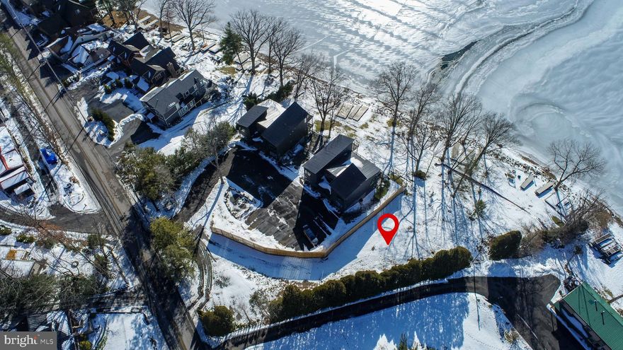 Amazing opportunity to build your lakefront home on Deep Creek Lake! Located on Deep Creek Drive, this level lot offers 100 feet of frontage, stunning lake views, and Type A Dock.  Over 300 feet of usable yard and deep water, a rare combination. Public water and sewer are available, making it easy for future build. Enjoy next year’s Fourth of July fireworks from your dock with quick access to local establishments, marinas, and Wisp Resort. A unique lakefront opportunity with strong fundamentals in one of the lake’s most active corridors. Call today for details!