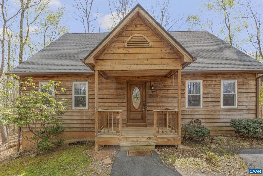 NEW OWNER WANTED. Private oversized lot located near Beach 4. This Lake Monticello home offers lots of space and a feel of privacy set back off the road and nestled among the trees.   Featuring a great kitchen with huge breakfast bar, formal living and dining room plus a spacious family room all on the main level. Second floor offers 3 sizeable bedrooms, the primary with en-suite, all with high ceilings and an air of living in a tree house. The entire home has new lvt flooring and has been freshly painted. There is a large rear deck overlooking the fenced back yard.  The large shed provides plenty of storage for kids and adult toys. Home also boasts a newer roof, and newer HVAC.,Oak Cabinets,Fireplace in Family Room