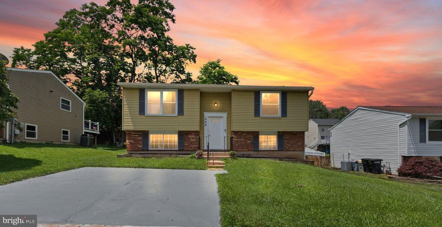 Welcome to this spacious and updated split foyer home that perfectly blends style, space & functionality!  Step inside to discover fresh paint and new flooring throughout, complemented by stylish updated light fixtures that add a modern touch. The spacious kitchen features new cabinets, counter tops & stainless steel appliances and opens to a screened-in porch that's perfect for relaxing or entertaining! 

Main level offers two comfortable bedrooms and a full bath, while the lower level includes three additional bedrooms and a second full bath-providing flexible space for guests, a home office, or multi-generational living. The lower level is also thoughtfully designed for accessibility, featuring a handicap-accessible ramp at the back door and also a walk-in shower. New windows on the lower level bring in plenty of natural light! 

Outside, there's a large, level backyard ideal for barbecues, gardening, or just hanging out.  Two car driveway for easy parking. Major systems have been updated for your peace of mind: Roof is 4 years old (25 yr architectural shingles), hot water heater is 2 years old, furnace is 3 years old.
