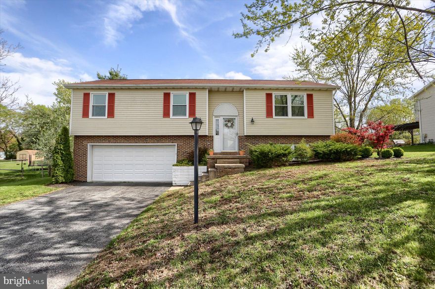 Your search is over!  This attractive and well maintained home features 3 bedrooms, 2 full baths, a 2-car garage on a half acre lot!  The beautifully updated eat-in kitchen with gorgeous cabinetry, tiled backsplash and granite counters leads to the rear deck that overlooks the large fenced backyard, complete with above ground pool and a shed with electric.  The living room is perfectly sized!  On the lower level is a family room, bonus room and laundry room.  The finished bonus room can be used for whatever your heart desires!  The primary bathroom has also been remodeled.  New windows (2023), a newer HVAC system (2017) and a country setting yet a convenient location.  For additional storage there is also attic storage with pull down stairs.  Located in Cumberland Valley School District and the Meadows development with convenient access to Route 81 and the Turnpike.  Schedule your showing today!