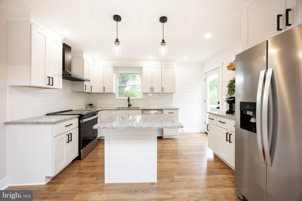 Photo of 704 W Bridge Street, PARKESBURG, PA 19365 (MLS # PACT2111426)