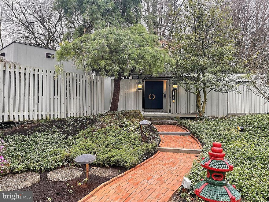 Welcome to a masterpiece of mid-century modern living nestled amidst the serene woodlands of South Whitehall Township. This custom redwood ranch home, built by Brookhaven circa 1972, exudes timeless elegance and quality craftsmanship. Set back on a picturesque 1-acre lot, this 3200 sq ft sanctuary boasts 4 bedrooms, 3.5 baths, a finished basement, storage area, & detached 2-car garage. Interior design by architect L. A. Berman, landscape by Herb Millstone, w/ later upgrades that include bump outs to living room, dining room & master bedroom wing. Step inside to discover an expanded floor plan, seamlessly blending form and function, or step outside to 3 terraced decks that extend the scope of nature’s palette. From the sun-drenched living spaces to the harmonious flow of materials & finishes, every aspect of this home is expertly executed. Natural light streams through multiple skylights, sliding glass doors, floor-to-ceiling windows, & a breathtaking cathedral-ceiling great room window offering panoramic views of backyard meadow and trees. Whether entertaining guests in the spacious living room or enjoying a quiet moment from gourmet kitchen outlook, this home offers a truly unparalleled living experience! Live in luxury and sophistication in this Mid-Century Modern gem, where every day is a celebration of impeccable design and exceptional comfort. Don't miss the opportunity to make this stunning property your own – schedule a viewing today and prepare to be captivated.