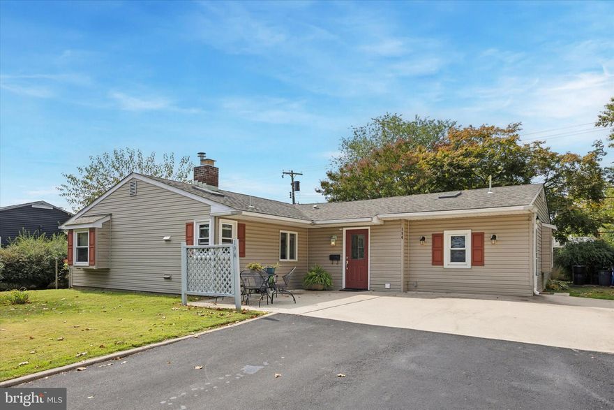 This expanded 3-bedroom ranch combines modern updates with a flexible single-level layout. A bonus room with a window, located off one of the bedrooms, adds versatile space—ideal for a walk-in closet, home office, or sitting area. The primary suite features a private full bath and a generous closet with extra storage. The kitchen features a large island, a corner sink with windows, and a skylight for natural light. It opens to the living/dining area, which includes a charming fireplace (capped when purchased). Down the hall are the other two bedrooms, one with double doors and a skylight. A separate laundry/mudroom includes a washer/dryer combo, utility sink, and direct access to the side yard. Outside, the home offers a spacious backyard, large front patio, newer roof (2017), and 4-car driveway. An above-ground oil tank was newly installed in 2023. Move-in ready and waiting for its new owner - schedule your showing today!
