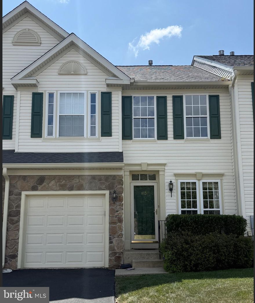 Welcome to this stunning upgraded  home featuring soaring 18-foot ceilings and abundant natural light, highlighted by two skylights—one in the dining room and another upstairs. Durable laminate flooring flows through the open-concept main level, connecting a spacious family room, elegant dining area with wainscoting, and a chef’s kitchen with custom cabinetry, pull-out pantry shelves, and access to a private deck with an electronic retractable canopy—perfect for outdoor entertaining.

The main-floor primary suite includes a double-vanity en-suite, walk-in closet, and built-in storage. The attached garage offers added organization with custom shelving.

The fully finished basement boasts a large living area, bonus room ideal for an office or guests, a half bath, and a laundry room with full-size washer and dryer. Upstairs, you’ll find two generously sized bedrooms—one with a walk-in closet—and a full bath with double sinks, plus the second skylight bringing in even more natural light.

Offering 3 bedrooms, 2 full and 2 half baths, this move-in-ready home in a desirable 55+ community combines comfort, flexibility, and thoughtful upgrades throughout.