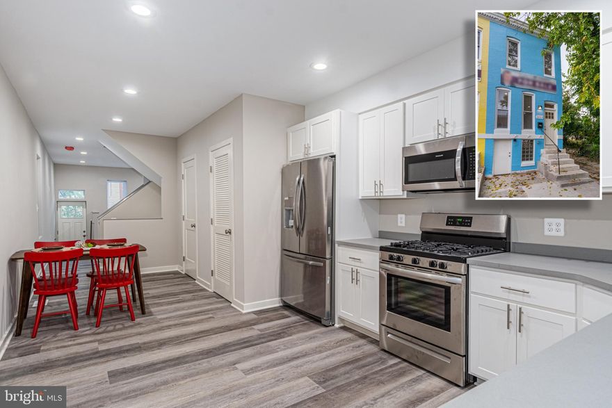 EXCEPTIONAL VALUE FOR THIS NEWLY RENOVATED ROWHOME WITH  OVER 20K IN FINANCIAL INCENTIVES FOR ELIGIBLE BUYERS!  Tons of renovations happening in the Harwood neighborhood which makes this the perfect time to take advantage of low interest rates and available grants.  This home features an open floor plan with vinyl plank flooring, designer kitchen with ss appliances and granite counters, a main level half bath, upper level with 3 bedrooms and 1 full bath, full basement that's perfect for storage, and a rear parking pad!  Why rent when you can have a mortgage payment lower than a rental payment!  Eligible for 10K Vacants to Value grant, $10k BRNI Boost Home Buying Incentive, $5k Community Development Block Grant, & the Vacant Dwelling Property Tax Credit - SAVE THOUSANDS!!!  This property is one of 6 renovations (only 2 left) in the Harwood neighborhood from the same  builder