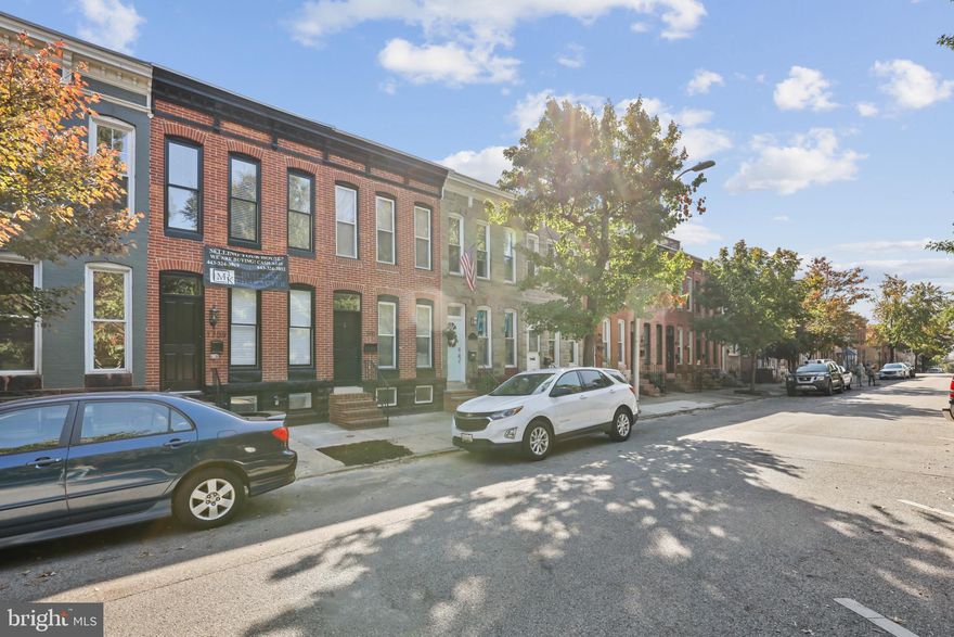 Brand New Federal Hill CHAP Renovation by Building Character with PARKING. 3 Finished Levels. The Main Level has a Large Living Room, Dining Room and Kitchen. The Upper Level offers 2 Bedrooms, 2 Full Baths and Direct Access to the Roof-Top DECK with Skyline Views. The Lower Level Includes 2 Additional Rooms, Third Full Bath and Laundry. All Insulation is Energy Efficient Spray Foam. Whole House Audio System. Custom Tile, Trim and Paint. And Don’t Forget the Amazing Building Character 2-Year Builder Service Warranty.