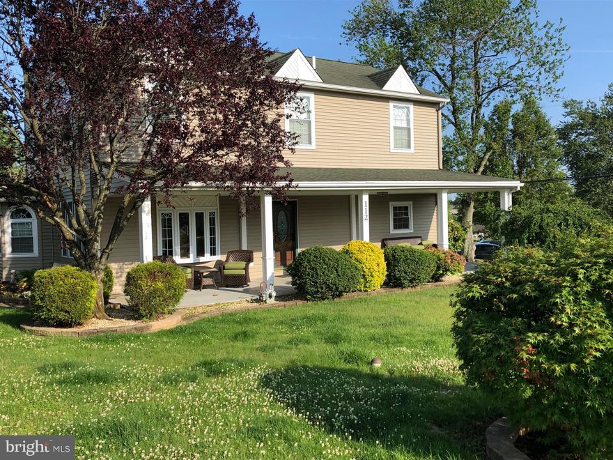 Welcome Home!  You'll want to see this one for sure!   Located on a nice corner lot in Fairless Hills is 112 Elmwood.  It's a special house, as you can see.   It's a WOW for sure.   Living Room, Updated modern eat in kitchen with breakfast bar over looking the  large family room with pellet stove fireplace.  There are two generous bedrooms on the first floor as well as a full bathroom, and the laundry.  Head upstairs to more very large bedrooms and another full bathroom.   Off of the family room enjoy your covered backyard patio.   Have several cars, or need room for storage?  Maybe you like to "tinker" on things, well enjoy your HUGE 2+ detatched garage...can anyone say Mancave?!   This is it.   This house is move in ready!   Bring your offers today!