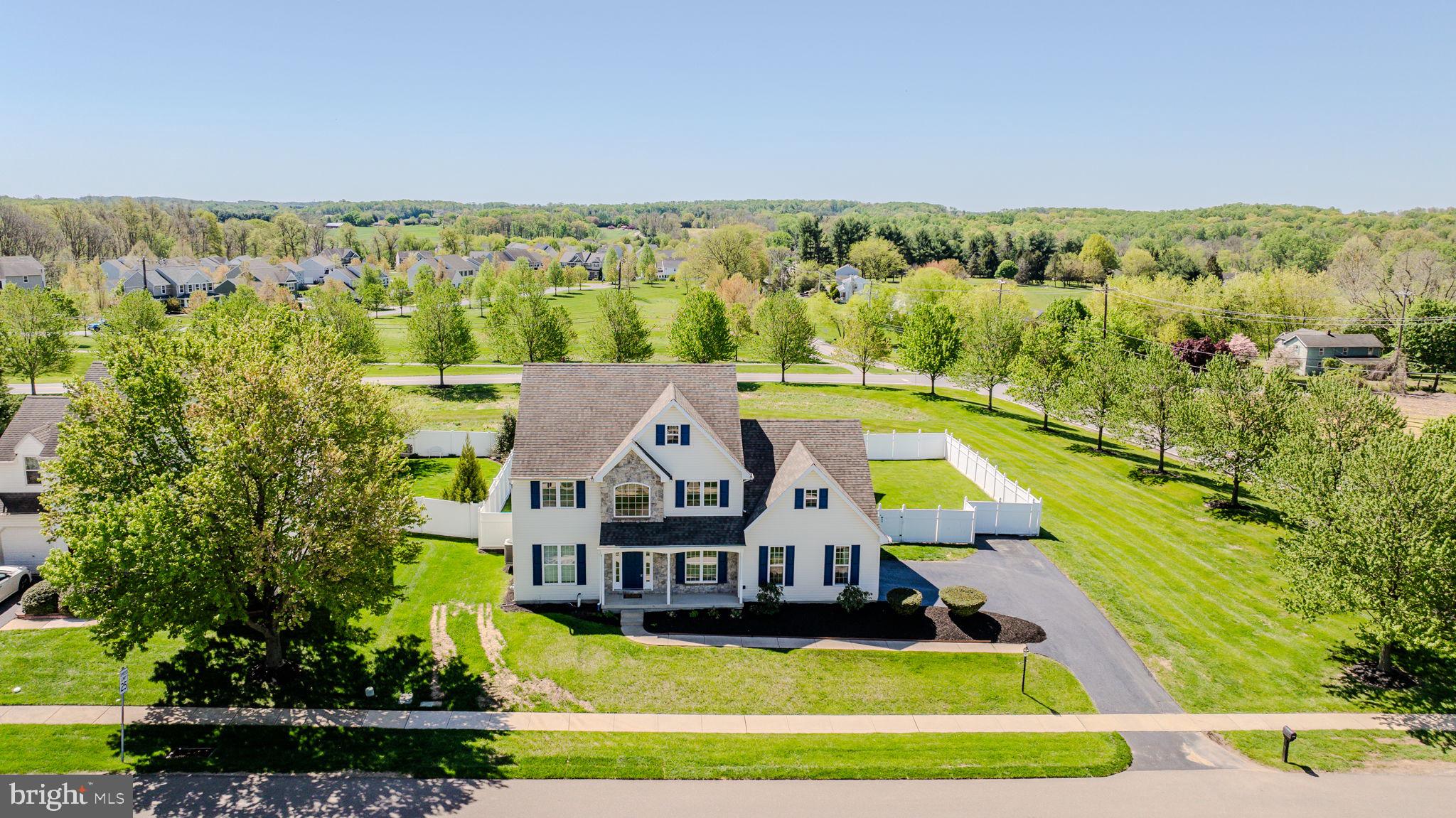 Welcome to 131 Martha’s Way, in West Grove’s highly sought-after community of Lamborn Hunt. This home has everything! Highlights include a main floor office, open living spaces, renovated kitchen & baths, a beautifully finished basement with gas fireplace, and a dream backyard oasis with in-ground pool and fenced yard. It doesn’t get any better than this! Step inside to a bright two-story foyer and hardwood floors leading to the professional office/den on one side and the open living room & dining room on the other; ideal for family gatherings. Flow into the open main living space joining the kitchen & family room, with recessed lighting and a view outdoors from each space. This kitchen features white cabinetry with undermount lighting, granite countertops, stainless steel appliances, oversized center island with seating, and the adjoining family room with vaulted ceiling and plenty of space to relax. From the main living space, step outside to the ultimate outdoor space starting with the expansive stone patio with built-in awning, a fabulous in-ground pool, two pergolas, and a completely fenced yard, offering total privacy. This is the perfect place for making memories with family and friends, just in time for spring and summer! Back inside and completing the main level is an updated powder room for guests and a laundry/mudroom located off the garage. Upstairs, you will find all 4 bedrooms and two baths, including the beautifully updated primary bath with granite double vanity and corner tub & shower, and an additional hall bathroom. The lower level of this home has been beautifully finished and offers space for your movie room, game room, rec room, office, gym, or whatever your needs require. With a gas fireplace, full bath, and several separated spaces, the possibilities are endless. Situated on a lovely corner property within the Avon Grove School District. Be sure to schedule an appointment today!