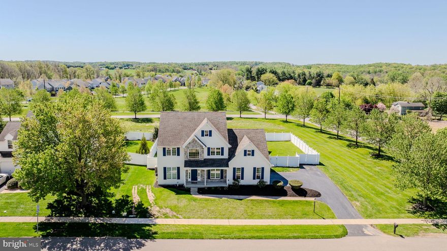 Welcome to 131 Martha’s Way, in West Grove’s highly sought-after community of Lamborn Hunt.  This home has everything!  Highlights include a main floor office, open living spaces, renovated kitchen & baths, a beautifully finished basement with gas fireplace, and a dream backyard oasis with in-ground pool and fenced yard. It doesn’t get any better than this! Step inside to a bright two-story foyer and hardwood floors leading to the professional office/den on one side and the open living room & dining room on the other; ideal for family gatherings. Flow into the open main living space joining the kitchen & family room, with recessed lighting and a view outdoors from each space. This kitchen features white cabinetry with undermount lighting, granite countertops, stainless steel appliances, oversized center island with seating, and the adjoining family room with vaulted ceiling and plenty of space to relax.   From the main living space, step outside to the ultimate outdoor space starting with the expansive stone patio with built-in awning, a fabulous in-ground pool, two pergolas, and a completely fenced yard, offering total privacy.  This is the perfect place for making memories with family and friends, just in time for spring and summer!   Back inside and completing the main level is an updated powder room for guests and a laundry/mudroom located off the garage. Upstairs, you will find all 4 bedrooms and two baths, including the beautifully updated primary bath with granite double vanity and corner tub & shower, and an additional hall bathroom. The lower level of this home has been beautifully finished and offers space for your movie room, game room, rec room, office, gym, or whatever your needs require.  With a gas fireplace, full bath, and several separated spaces, the possibilities are endless. Situated on a lovely corner property within the Avon Grove School District.  Be sure to schedule an appointment today!