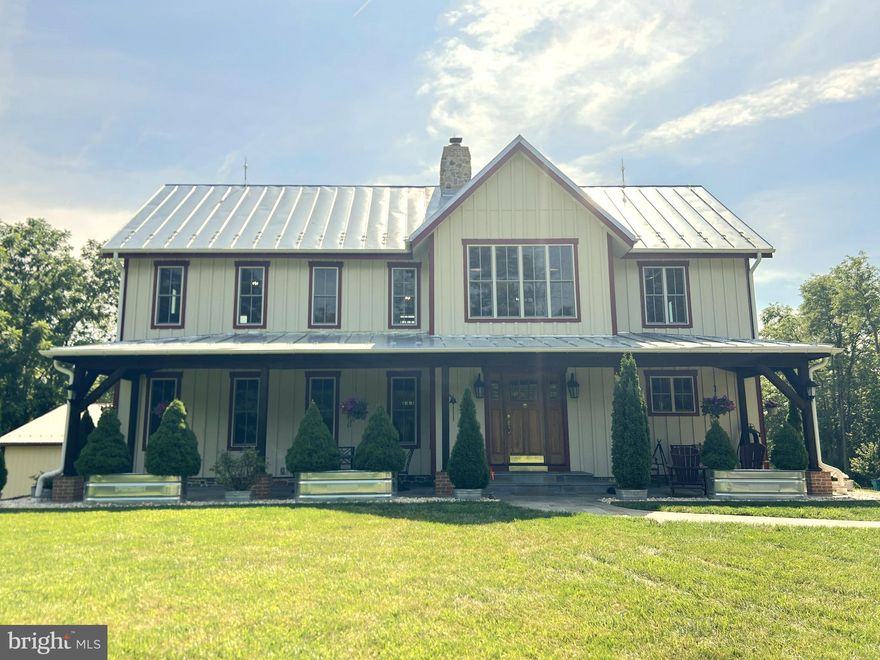 Upcoming auction on Saturday, September 27th at 12 noon. Let this paved scenic driveway lead the way to the house of your dreams. Built in 2017, this 2712 Square foot, three bedrooms, 2 1/2 baths, custom built home, sitting on 64 acres, is truly one of a kind. The main level of this home encompasses an open floor plan consisting of a large kitchen, dining room, and family room. The main floor also includes a primary bedroom and its own private bathroom, a laundry room, and a half bath. The main level of the home has access to a large raised deck with a hot tub and views that will take your breath away. The second floor of this home encompasses a wrap around balcony, 2 bedrooms, a full bath, and an office area. This home features 26 foot tall  with 360 degree stone fireplace that can be viewed from both the main level and the second floor of the home, and a barn / log wood beam interior. The unfinished basement boasts access to the rear patio area, two garage bays, a multipurpose room, and a utility room. In addition, the house has a generac guardian whole house generator. On top of the home's amenities, the property along with a detached three car garage, a detached machine shed, a three sided shed, a pavilion with a brick fireplace, and a fire pit area. If you're looking for a secluded property, ordering Cunningham Falls State Park, with lots of opportunities for entertainment and recreation, endless Wildlife and peacefulness, you do not want to miss out on the chance to make this property yours. List price in no way represents the minimum, starting, or acceptable bid. It is used as a guide to find the home.