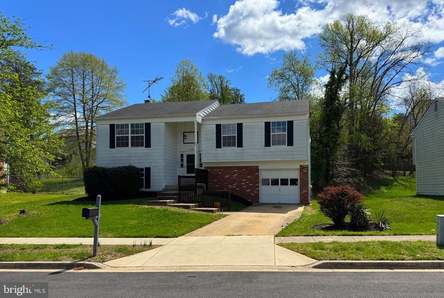 Welcome to this spacious split-level home in the heart of Fort Washington. Featuring 4 bedrooms and 3 full baths, this property offers comfortable living across two levels. The main floor includes 3 generously sized bedrooms and 2 updated bathrooms, while the lower level provides additional flexibility with a private bedroom, full bath, and separate entrance—perfect for guests or multi-generational living. Enjoy beautiful hardwood flooring on the main level,  adding warmth and style to the space. The kitchen comes equipped with two refrigerators both included with the home. Outdoor living is easy with two decks redone in 2019—deck furniture conveys—and a fully fenced chain link rear yard, ideal for entertaining or pets.

Fort Washington, offers a harmonious blend of historical richness, natural beauty, and modern conveniences. Situated in a serene residential neighborhood, the area is characterized by tree-lined streets and well-maintained homes, providing a peaceful suburban atmosphere.

Just a short distance away lies Fort Washington Park, a 341-acre national park steeped in history. Originally constructed in 1809 to defend the nation's capital, the fort now serves as a site for exploration and education. Visitors can traverse the 3-mile perimeter trail, engage in birdwatching, or fish along the Potomac River.

For additional outdoor recreation, Fort Washington Forest Park provides nearly 19 acres of green space, ideal for picnics and leisurely walks. The community boasts access to 21 parks, ensuring residents have ample opportunities to enjoy nature.

Culinary enthusiasts will find a variety of dining options nearby. Proud Mary Restaurant offers seafood dishes with scenic waterfront views, while Charlie’s Family Restaurant provides a cozy setting for classic American fare. The proximity to National Harbor expands the dining and entertainment choices, featuring attractions like the Capital Wheel and a range of eateries.

Transportation is convenient, with access to major roadways such as Indian Head Highway (MD-210) facilitating easy commutes to Washington, D.C., and surrounding areas.