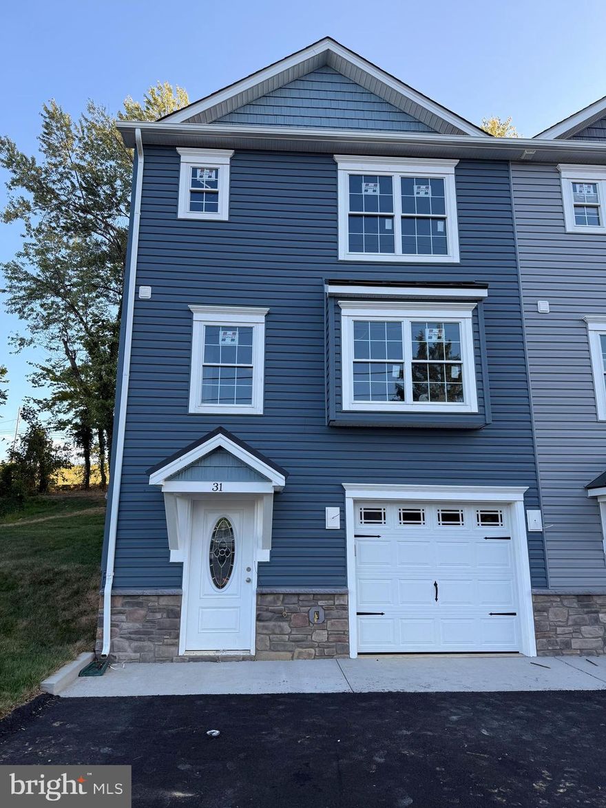 REDUCED 60K!  100% Complete-Move In Ready!  Luxury End Unit 3 Level Townhome Offers 3 Bedrooms, 3 1/2 Baths, Finished Basement, 1 Car Garage, With Electric Car Charging Outlet & Large Rear Trex Deck, Vinyl Railing, 6' Vinyl Privacy Divider, Perfect For Entertaining. Located Minutes To I-66 & I-81, Shopping, Restaurants, Golf & So Much More. This New Home Offers Luxury Vinyl Plank Flooring Throughout, Kitchen With Upgraded Quartz Counter Tops, Stainless Steel Appliances, & Breakfast Bar. Great Large Open Dining & Living Room Offers So Many Options, With Even A Nook For Your Desk. This Opens To Rear Trex Deck Perfect For Entertaining Or Enjoying The Outdoors. Upper Level Master Suite Complete With Double Vanity Master Bath & Plenty of Closet Space. Two Additional Bedrooms, Full Bath & Upper Level Laundry For Added Convenience. Finished Lower Level With Family Room & Full Bath Offering Many Options For Use. One Car Garage, & Additional Parking Available. Work From Home No Worries, High Speed Internet Is Available. No HOA. 45 & 37 also available for sale