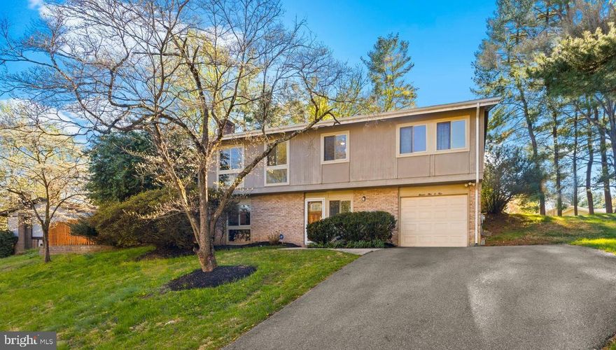 Exceptionally maintained Mid-Century Modern 4BR, 3FB home. Set on a generous 10,706 sq ft lot in a serene, park-like setting, this home offers a rare sense of peace and privacy, highlighted by a truly stunning, fully screened and enclosed porch that elevates indoor-outdoor living, filled with natural light and surrounded by greenery. From the moment you arrive, you’ll appreciate the care and attention that make this home truly move-in ready. ***UPPER LEVEL: Step into a bright, open living and dining area with soaring cathedral ceilings, warm wood floors, and oversized windows that fill the space with natural light. The stylish kitchen features quality cabinetry, quartz countertops, and Samsung stainless steel appliances, designed for both everyday living and entertaining. This level also includes three bedrooms and two full baths, including a spacious primary suite. The sunroom, opening directly to the surrounding deck, creates an effortless indoor-outdoor flow. Perfect for relaxing or hosting. ***ENTRY LEVEL: The lower level offers a comfortable Great Room with a wood-burning fireplace, built-ins, recessed lighting, and durable luxury vinyl flooring. A bedroom and full bath provide ideal flexibility for guests, a private office, or multi-generational living. Ample storage and a separate laundry room add to the home’s functionality. ***OUTDOOR: Enjoy a private, peaceful backyard with a seamless connection from the sunroom to the deck, creating an inviting extension of your living space—ideal for gatherings or quiet evenings outdoors. ***RECENT UPDATES include a new roof (2021), kitchen remodel, primary bath remodel with a walk-in shower, and a frameless glass enclosure. and neutral tiles. Additional updates include the hallway bath with a new cabinet, mirror, and shower door, LG washer and dryer (2025), and garage door, all completed within the last five years. All four ceiling fans are brand new, including the one in the porch. ***THE ENCLOSED PORCH: The sunroom feels like a private retreat where you can relax, unwind, and enjoy the beauty of the outdoors in comfort year-round, accessible from the living and kitchen areas. ***LOCATION AND COMMUNITY: Ideally located in the sought-after Dufief neighborhood with top-rated schools, just minutes from Rio, Kentlands, and Fallsgrove, offering a wide range of shopping and dining options and easy access to I-270. Enjoy the nearby parks, trails, tennis courts, and the neighborhood pond. This location offers both convenience and a high quality of life. This is a rare opportunity to own a well-updated, move-in-ready home in an established community.