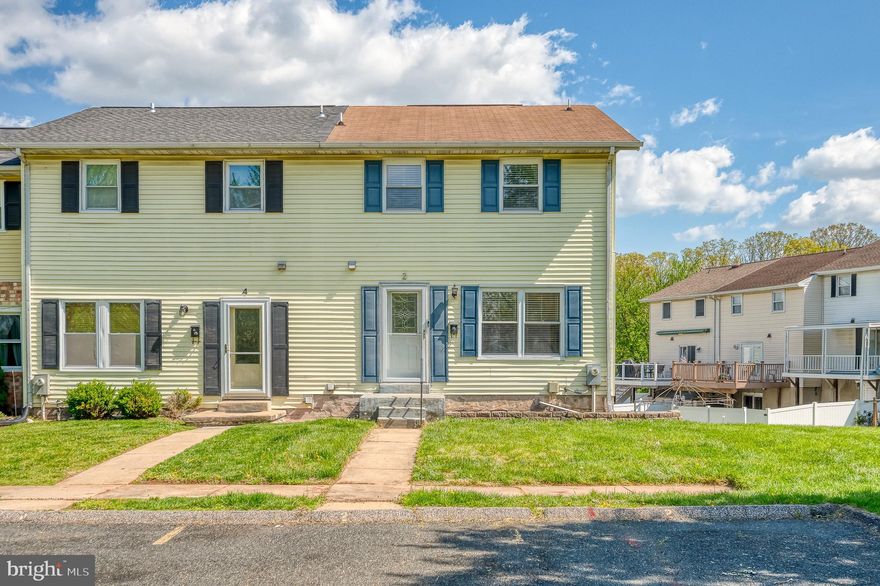Located in Hazelwood Village, Rosedale, this 3-level Colonial-style end-of-group townhome offers 3 bedrooms, 2.5 bathrooms, and a well-designed layout. The main level features luxury vinyl plank flooring in the kitchen, dining, and living areas, while the finished basement provides a cozy carpeted space. Enjoy outdoor living with a wood deck and fenced rear yard—ideal for relaxing or entertaining. Recent updates include HVAC (2021) and water heater (2022). The HOA covers trash, water, and snow removal.
