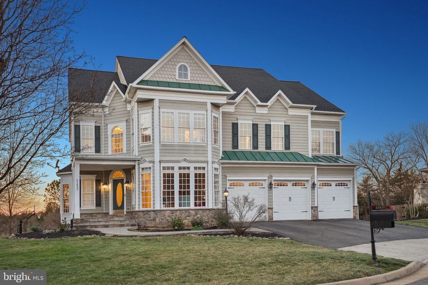 Welcome to 21835 Engleside Place! A captivating residence nestled in one of the most sought after neighborhoods in Ashburn. This 5-bedroom, 5.5-bath Hemingway model home boasts over 6,000 sq ft. Beautifully set in a cul-de-sac and against the backdrop of a tranquil pond, relish in daily sunsets from your primary suite or while preparing meals in the gourmet kitchen. Entertain with ease in the backyard oasis, offering ample space for gatherings and leisure. The chefs kitchen boasts stainless steel appliances, a double oven, and sleek granite countertops, ideal for culinary adventures. Unwind in the spacious family room, complete with a cozy gas fireplace, or savor your morning coffee in the screened in porch overlooking the serene landscape. Ascend the stairs to discover the luxurious primary suite, featuring a sitting area and a fully renovated bathroom, offering breathtaking views of the mountains and pond. 
The fully finished basement presents endless possibilities for entertainment, with potential for a movie theatre, gaming room, or home gym. Updates and highlights of the home include brand new roof (2024), refinished wood floors in the family room (2022), new carpet upper level and basement (2022), ensuring modern comfort and style throughout. 
Don’t miss out on this opportunity of prime location and luxury. Embrace the lifestyle of Broadlands South, which provides walking trails, pools, tennis courts, and basketball courts. Exceptional schools including Mill Run Elementary, Eagle Ridge Middle School, and Briar Woods High School enhance the appeal of this remarkable home. Welcome to your new haven.