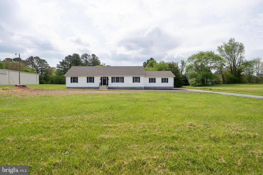 Discover peaceful country living just minutes from downtown Snow Hill with this beautifully refinished 3-bedroom, 2-bath rancher, nestled on two combined parcels : 2402006138, 2402006111 totaling 3.94 acres. This move-in ready home has been thoughtfully updated with fresh finishes throughout, offering modern comfort and timeless charm.

Inside, you’ll find a bright, open floor plan with new flooring, updated fixtures, and a stylish kitchen complete with stainless steel appliances and ample cabinetry. The spacious primary suite features an en-suite bath, while two additional bedrooms and a second full bath provide flexible living options for family, guests, or home office use.

Step outside to enjoy expansive yard space, mature trees, and room to grow—perfect for gardening, outdoor entertaining, or even hobby farming. With nearly 4 acres across two parcels, there's incredible potential for future expansion, recreation, or simply enjoying the tranquility of nature.

Located just a short drive from Snow Hill’s historic district, local shops, parks, and the scenic Pocomoke River. Properties like this don’t come along often—schedule your private tour today!