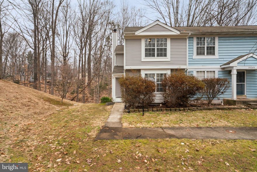 This lovely home is ready and waiting for it's new owners!  Spacious end unit in Montclair community backs to trees, features granite counter tops, eat in kitchen, spacious rooms, fully finished walk out basement, family room with fireplace, bonus/flex room that can be used for office, exercise room, craft space and more.  Amenities abound including a 109 acre stocked lake with 3 beautiful sandy beaches, boat ramp, boat storage, fishing piers, playground/tot lots, ball fields, volley ball and basket call courts, dog park, 18 hole golf course and Country Club and sooooooo much more!  You can actually vacation and never leave home here!  Please park in space 15343 if available.  Please wear FOOTIES while touring property.