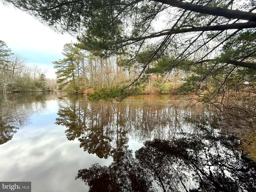 Build your dream home on this beautiful water front wooded lot tucked away on a quiet cul-de-sac on Lake Lariat in Chesapeake Ranch Estates. Enjoy the privacy of mature trees while still being part of an amenity-rich community featuring multiple private beaches, walking trails, playgrounds, and a campground. Ideally located close to local dining, shopping, Calvert Cliffs State Park, and Patuxent River Naval Air Station (PAX River) for an easy commute. Public water hookup is available. There are no Health Department records of prior perc testing, giving a buyer a fresh opportunity to explore building options. A great opportunity to own land in a well-established community with so much to offer—don’t miss it!