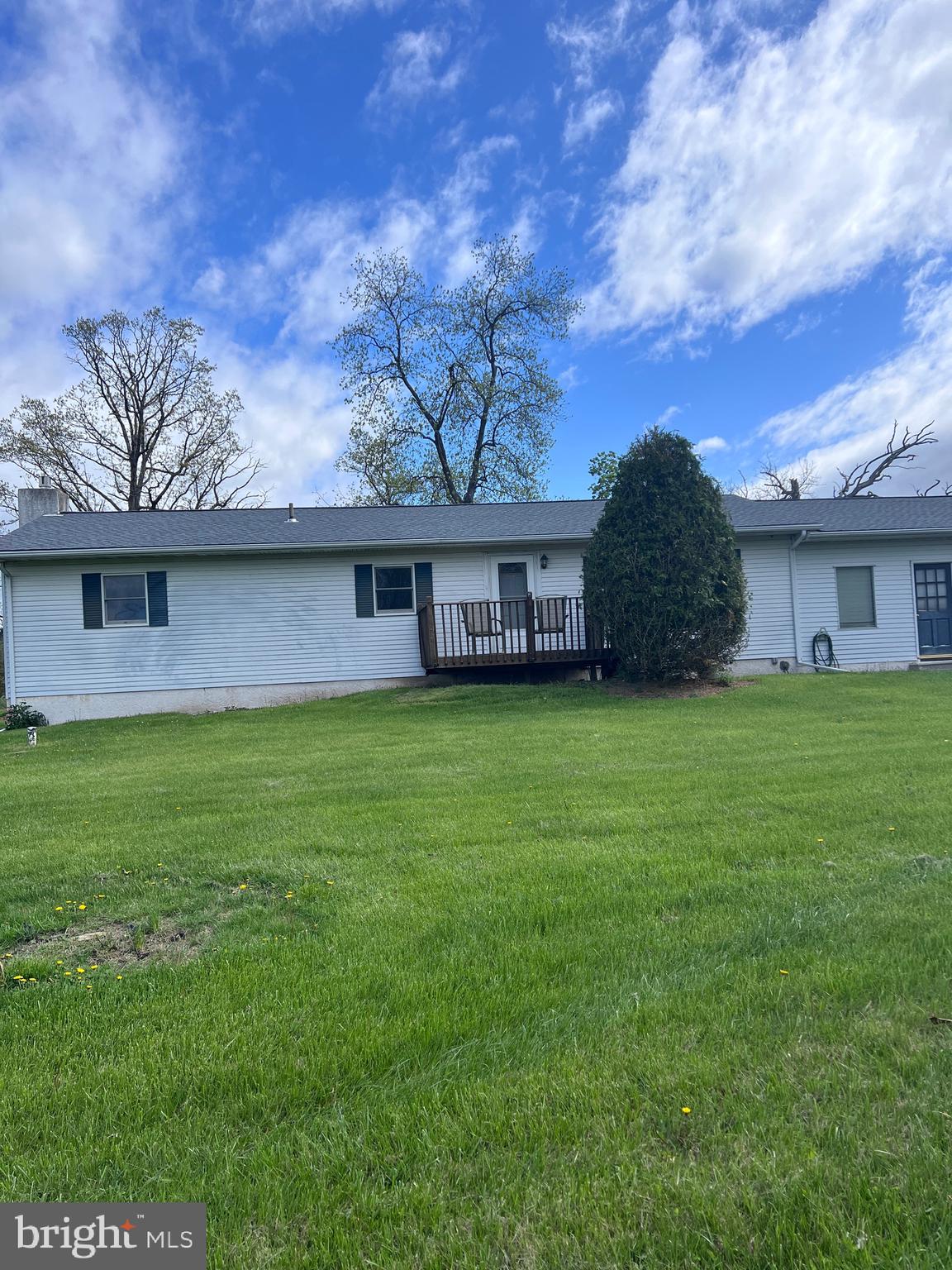 3 BR, 1 1/2 BA ranch with living room, dining room and kitchen. Full open basement, partially finished with fireplace. Breezeway for storage and 2 car garage included. Plenty of parking. Rear deck. Beautiful country setting.