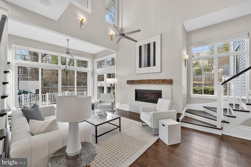 Situated in the heart of Kent adjacent to Key Elementary, this light filled home blends sophisticated formal spaces with a modern open floor plan creating a private oasis in the middle of Washington D.C.! Featuring 7,100SF across four finished levels, this residence truly has it all including 8 bedrooms, 7.5 baths, spacious entertaining areas, private offices, media room, exercise room, indoor spa area, game room, wine cellar, elevator to all levels, outdoor terraces, garage and more. Originally built in 2016, the home features top-of-the-line finishes, custom millwork, and premium appliances throughout. Expansive floor-to-ceiling windows in the vaulted family room and gourmet kitchen are a showstopper and flood the main level with natural light, which also opens to a serene side patio. This level also includes formal living and dining rooms with gas fireplace, office/optional bedroom with full bath, powder room, and mud room with direct access to the two-car garage. The open stairway leads to a second level with a luxurious primary suite that includes two walk-in closets and en-suite bath with double vanities, soaking tub, and shower. Three additional bedrooms, two baths, laundry #1, and a charming front porch complete this floor. All the fun is found on the third level with a large game room, wet bar, access to a top floor deck with fireplace, two additional bedrooms, full bath, and storage. The fully finished lower level, which also serves as the perfect guest suite, offers a private media/rec room, spa with jacuzzi and steam shower, wine cellar, exercise room with full bath, bedroom/optional office, and laundry room #2. Located just minutes from Georgetown, Virginia, and Maryland, with easy access to all area airports, this neighborhood is coveted for its close proximity to the conveniences of the city coupled with the privacy and quiet of residential living. Residents enjoy several nearby shops and restaurants (Et Voila, Bambu, Sweet Agave, Bistro Aracosia, Starbucks & more), as well as neighborhood amenities such as the Palisades Rec Center and Playground, Sunday Palisades farmer's market, the Capital Crescent Trail, and Battery Kemble Park.