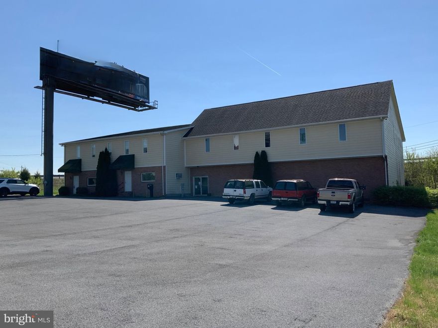 Commercial opportunity with 12,722 sq ft of space located on 2.20 acres suitable for professional offices, medical, retail, office or mixed-use. Accessibility and visibility in a high-traffic area off Edwin Miller Blvd conveniently located near I-81. Potential for multi-tenant or mixed-use occupancy. With its strategic location and substantial square footage, this property presents endless possibilities for investors or business owners looking to expand or establish their presence in a thriving commercial corridor. Previously used as a Survey Business and sports facility. See Features Sheet for detailed information. All information provided is deemed reliable but is not guaranteed and should be independently verified by the buyer. This includes, but is not limited to, square footage, lot size, utilities, property features, and condition. Buyer is responsible for conducting their own due diligence and confirming all information to their satisfaction prior to purchase.
