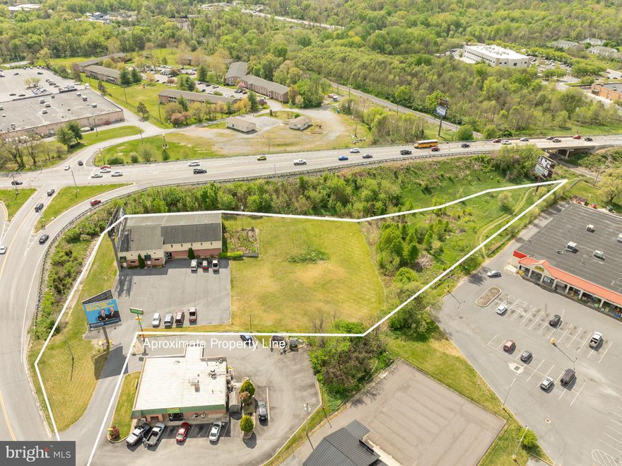 Commercial opportunity with 12,722 sq ft of space located on 2.20 acres suitable for professional offices, medical, retail, office or mixed-use. Accessibility and visibility in a high-traffic area off Edwin Miller Blvd conveniently located near I-81. Not within the City limits. Potential for multi-tenant or mixed-use occupancy. With its strategic location and substantial square footage, this property presents endless possibilities for investors or business owners looking to expand or establish their presence in a thriving commercial corridor. Previously used as a Survey Business and sports facility. Agents Download Features Sheet Doc for detailed information. All information provided is deemed reliable but is not guaranteed and should be independently verified by the buyer. This includes, but is not limited to, square footage, lot size, utilities, property features, and condition. Buyer is responsible for conducting their own due diligence and confirming all information to their satisfaction prior to purchase.