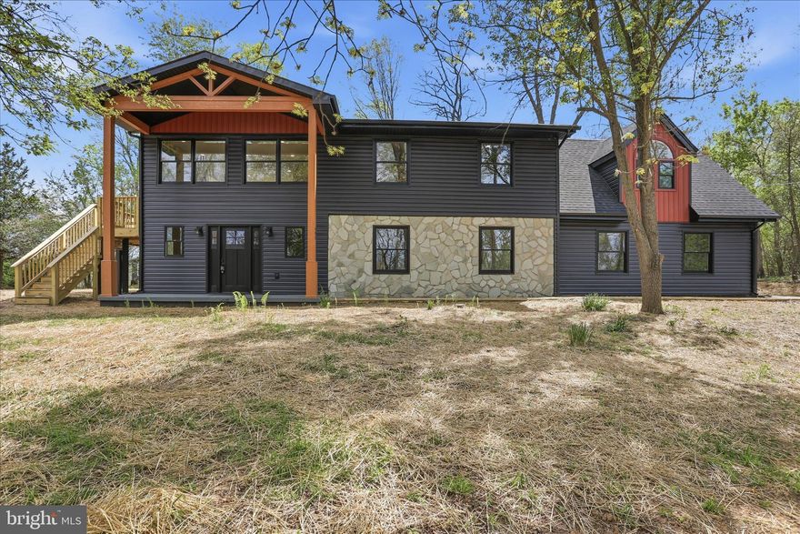 Welcome to 603 Persimmon Ln, Shepherdstown, WV—a beautifully fully renovated home situated on 1.5 acres of serene, natural surroundings.
This spacious residence features 5 bedrooms and 3 full bathrooms, offering a flexible and functional layout ideal for both everyday living and entertaining. The home has been thoughtfully updated throughout, creating a fresh, modern feel while maintaining warmth and charm.
Major exterior upgrades provide peace of mind and lasting value, including a brand-new roof, new siding, and newly constructed decks, enhancing both curb appeal and outdoor living space. These improvements make the home truly move-in ready from the inside out.
Inside, large windows fill the home with abundant natural light, creating bright and inviting living areas. The floor plan flows comfortably between spaces, offering room for gathering, relaxation, and privacy.
The primary suite serves as a private retreat, featuring a spacious bedroom and a beautifully renovated en-suite bath with elegant, modern finishes.
Additional bedrooms are generously sized and versatile, perfect for guests, home offices, or hobby rooms, with updated bathrooms that reflect the same level of care and style.
Set on 1.5 acres, the property provides ample outdoor space for enjoying nature, entertaining, gardening, or simply relaxing in a quiet setting.
A rare opportunity in Shepherdstown—fully updated, thoughtfully improved, and ready to welcome its next owner.