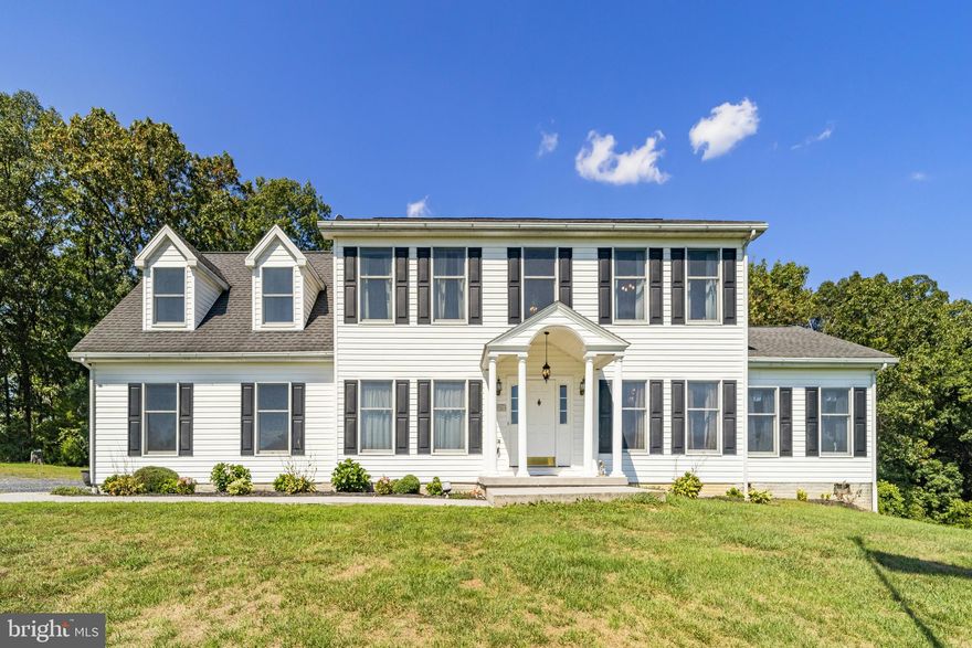 OPEN HOUSE SATURDAY OCTOBER 2ND FROM 12-2PM

Just south of Strasburg yet close to all the amenities of town, this classic American Colonial home is situated on 18 nearly unrestricted acres. Adjacent to the Fishers Hill Civil War Battlefield which is conserving additional lands and surrounded by family farms, this land has been preserved since the burning of the Shenandoah without large subdivisions invading.  With a traditional layout that includes formal living and dining areas as well as a den full of light that can be utilized in a number of ways. The kitchen is laid out with a center island and eating area that offers access to the expansive deck as well as a second access point through the den. Upstairs is where all the bedrooms are located from the primary suite with jetted tub and separate shower to the bonus room.The bonus room has been completely customized for a home office with high speed internet, several built-in bookcases, lighted cubbies, a window seats located in the dormers, and a cedar closet for additional storage. Below grade, the basement is awaiting your personal touch; currently it is partially finished and offers wide outside access for maintenance ease. To round things out, a 2 car attached garage, a 30x90 pole barn, and a sizable garden shed make sure that you have plenty of dry space for everything you need to enjoy life here.