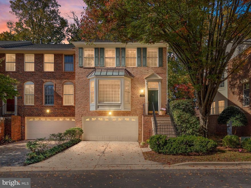Welcome to 11334 Hollowstone Drive. An exquisite end-unit townhome nestled in a highly sought-after North Bethesda neighborhood. This meticulously maintained residence offers a perfect blend of elegance, comfort, and location.... perfect for the modern homeowner. 
Step inside to discover an open floorplan highlighting the natural light throughout your home. The kitchen has ample counterspace and cabinets for your culinary needs. Enjoy your morning coffee or a glass of wine on your rear deck...one of the most private decks in the community! The stairs are an architectural beauty, and being and end unit, you have an entire wall of windows guiding you to the upper level.  Here, you will find your primary suite. The primary bathroom is an oasis in your large tub or enjoy your oversized walk-in shower. Smartly spaced away from your primary are two other generous-sized bedrooms and a bathroom.  The lower level boasts new carpeting, a fireplace, and a third full bathroom! The sliding glass doors provide easy outside access to your patio area, again, soo private.  With your prime location, this townhome is just steps away from the Bethesda Trolley Trail, Pike and Rose, iPic theater, Whole Foods, Fitness centers, Salt caves, and TWO metro stops, as well as easy access to 270, 355, and 495. Location, location, location!!!