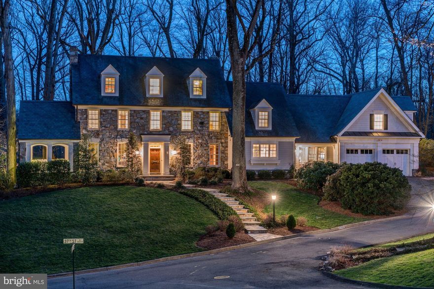 Private .65 acres surrounded by 33 acres of parkland. This exquisite home was expanded and totally remodeled in 2007. Beautiful addition w/gourmet kitchen opens to family room that leads to backyard w/ lighted sports court, batting cage, hot tub, and fire pit area. 6BR & 5BA upstairs. Property includes divided lot. One light to DC. Seldom is a property like this available in N. Arlington.