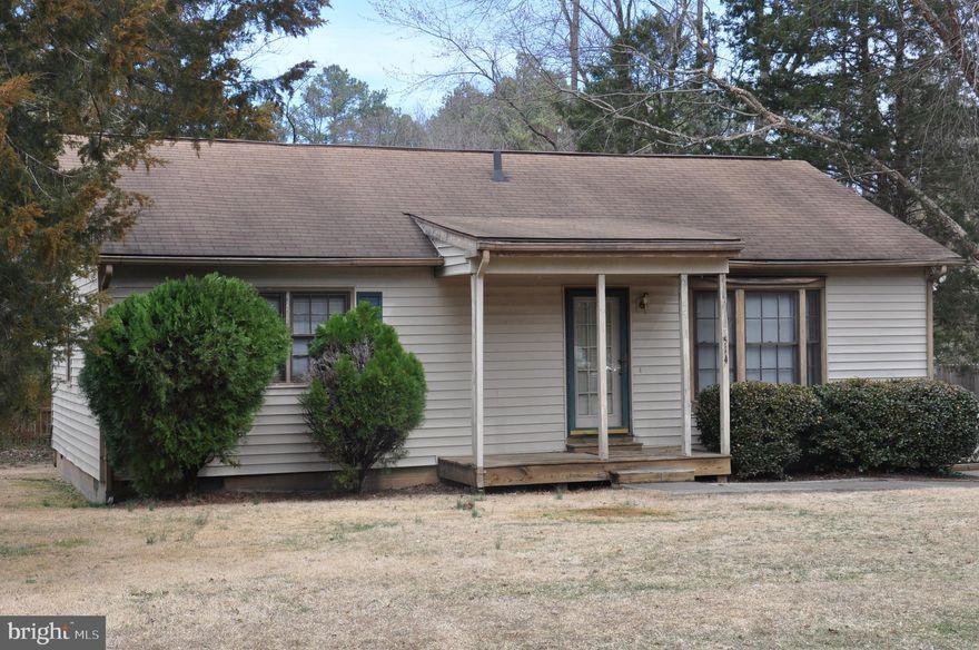 This previously income producing house is located in a gated community with many amenities to include private lake privileges. This established community is just off of US Rt 1 and minutes away from the convenience of I-95 exit 110 and I-95 Exit 104. The house is need of some work but boast a fair sized shed and tree buffer along the front of property. Future investment potential, being sold "AS IS".