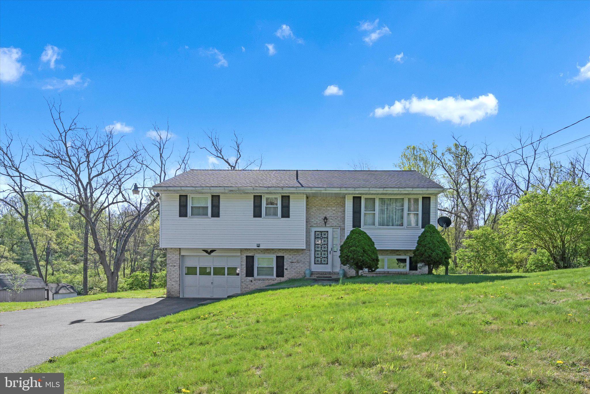This bi-level single-family home is located in the Conrad Weiser School District and offers 3 bedrooms and 2 full baths. Enjoy outdoor entertaining on your oversized deck. Overlooking an amazing backyard. With just over an acre of land, it provides plenty of outdoor space, along with two storage sheds for added convenience. This home was well maintained, Has ample living space and a comfortable lower level—What a great opportunity to call it your own and build equity.
Home is an estate and is being sold "As- Is"
A 1-year home warranty is included for added peace of mind. Don’t miss this solid value in a quiet, rural setting!!