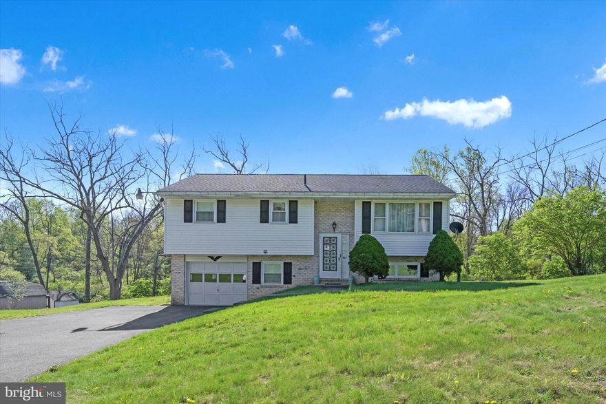 This bi-level single-family home is located in the Conrad Weiser School District and offers 3 bedrooms and 2 full baths. Enjoy outdoor entertaining on your oversized deck.  Overlooking an amazing backyard. With just over an acre of land, it provides plenty of outdoor space, along with two storage sheds for added convenience.  This home was well maintained, Has ample living space and a comfortable lower level—What a great opportunity to call it your own and build equity.
Home is an estate and is being sold "As- Is"
A 1-year home warranty is included for added peace of mind. Don’t miss this solid value in a quiet, rural setting!!