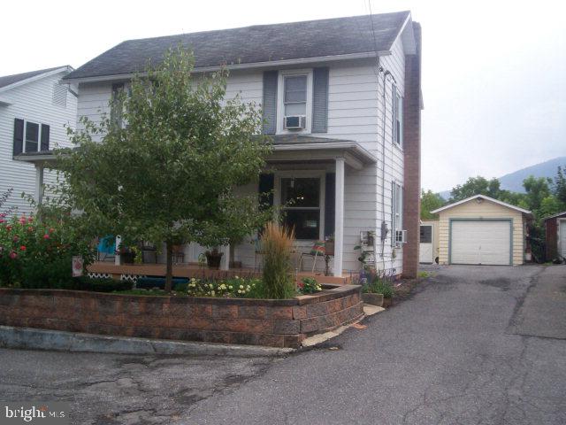 Nice 2 story in great area on dead end street; large yard and 1 car garage; wood floors and pellet stove.