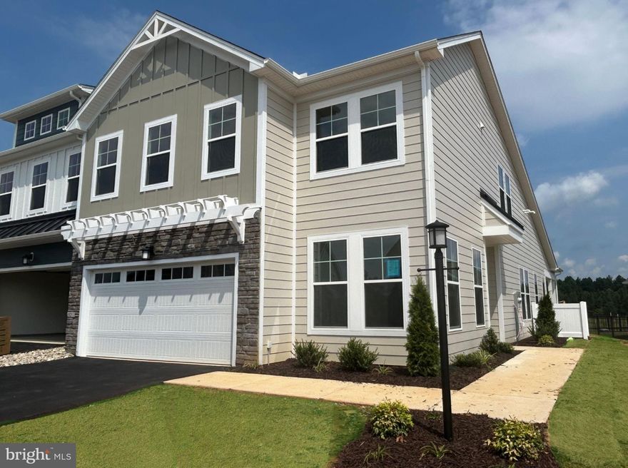 This home is MOVE-IN READY! The Madison plan offers three bedrooms, 2.5 baths, and a two-car front-load garage. Beautiful and durable LVP flooring flows throughout the first-floor main living areas. As you enter, you’ll find a home office space tucked off the foyer. The heart of the home is the spacious kitchen, featuring a large center island, granite countertops, a tile backsplash, stainless steel appliances, and an ample pantry. The adjoining dining area features a chandelier and provides the perfect space for everyday living and entertaining. Natural light pours into the great room from several large windows overlooking the covered patio. A gas fireplace completes the great room. Tucked at the back of the home is the FIRST-FLOOR primary suite featuring a spacious walk-in closet, a tray ceiling, and an ensuite LUXURY bath
with a curbless walk-in shower and a double vanity. A powder room for guests and a spacious laundry room complete the
first floor. Upstairs, you'll find a spacious loft area. Bedrooms two and three both feature walk-in closets and share a Jack
& Jill bath with separate vanities. An unfinished storage area completes the second floor. Enjoy low-maintenance living just
minutes from downtown Charlottesville in this gated community! All lawn maintenance is taken care of by the community,
allowing you free time to pursue your passions and enjoy all of the amazing amenities this community has to offer: a
community pool, walking/biking trails, a clubhouse, a fitness center, and sports courts, including both tennis and
pickleball. Enjoy close proximity to the Spring Creek Golf Course that flows throughout the community and access to The
Tavern on the Green Restaurant that offers indoor and outdoor dining. Offering 24/7 security and an active community,
Spring Creek is the home you've been looking for!