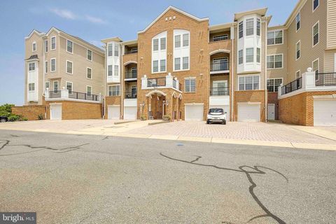 Photo of 8610 Fluttering Leaf Trail #208, ODENTON, MD 21113 (MLS # MDAA2128770)