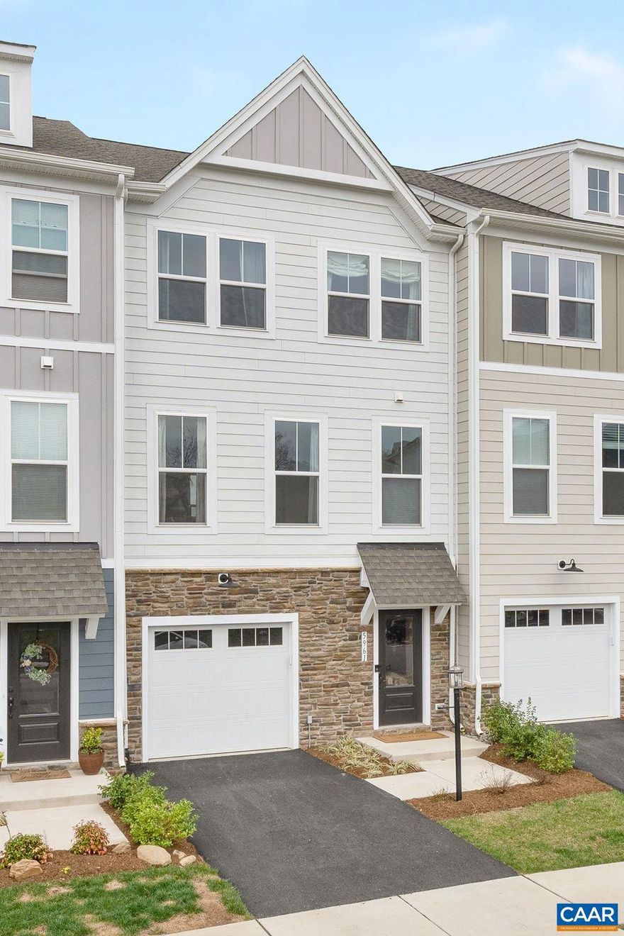 Why wait for new construction? MOVE RIGHT IN and enjoy mountain views from this like-new home! The lower-level walk-out flex space features brand new carpeting, backyard & half bath. Great for home office, rec room, or home gym. Step outside to the newly installed fenced yard, ideal for pets and play! The open-concept main level boasts 9? ceilings, luxury vinyl plank flooring, and a spacious kitchen with GE appliances, quartz counters, a large island, pantry, and ample storage. Enjoy meals with a view overlooking the clubhouse, green space, and playground. Relax on the rear deck just off the family room, also great for grilling out & entertaining. Upstairs, the primary bedroom offers a walk-in closet and en suite bathroom. with tiled walk in shower. Two additional bedrooms with mountain views, a full bath, and side-by-side laundry complete the picture. Enjoy the views, tranquility, and community of Pleasant Green?walking distance to favorite spots such as Crozet Pizza, Crozet library, Mud House Coffee, and more! Super convenient to I-64 & Rt 250 for easy commute to UVA Hospital, downtown mall & 5th Street Station.,Quartz Counter,White Cabinets,Fireplace in Family Room