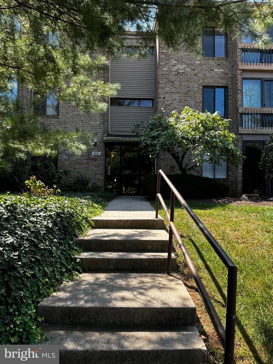 ATTENTION FIRST-TIME BUYERS AND INVESTORS - HANDYMAN SPECIAL! Nestled in the heart of Wilde Lake Village, this condo boasts an unbeatable location and a price that’s perfect for both first-time buyers and savvy investors. Priced to sell, this is your golden opportunity to own a piece of this vibrant, well-maintained community—complete with low condo fees that won’t break the bank! Maintenance and repairs ongoing. Seller will consider closing credit to finish - Bring Offers!
Step right out into the fresh air from your own walk-out level condo! With a generous 757 square feet, this 1-bedroom gem offers plenty of room to live, work, and entertain. The main living area shines with stylish and durable luxury vinyl flooring, setting the stage for modern living. 
Versatility awaits with an enclosed space off the living room, featuring a window and overhead lighting, that can be used as the perfect home office, guest room, or dining area, or opened to make open LR/DR area. Cozy up by the wood-burning fireplace on chilly evenings, adding warmth and ambiance to your home. Then, enjoy the family room space in the sunroom, which opens directly to your private walk-out garden area—ideal for morning coffee or evening relaxation.
The kitchen is  equipped with white cabinetry,  a gas range, a convenient built-in microwave, and a handy pantry for storage needs.  The full bath, featuring a generously sized remodeled stall shower with a trendy barn door entry. The expansive main suite comes complete with a walk-in closet and plush new carpeting for ultimate comfort.
Practical perks abound: enjoy the convenience of in-building laundry and your own private storage compartment. Plus, water and gas are included in the low condo fee! Parking is a breeze with your assigned space just steps from the building, alongside ample guest parking for visitors.  SECURITY SYSTEM AND HOME WARRANTY OFFERED!
Live in the center of it all! This prime location is just minutes from Columbia Mall, public transportation, and the vibrant Symphony Park at Town Center, offering an array of dining, shopping, and entertainment options. Embrace the ultimate walkable lifestyle—grab your morning coffee at Starbuck’s, take a dip in the indoor pool complex, enjoy a match at the Tennis Club, or easily access Wilde Lake Middle and High Schools, all within walking distance. You’re also close to world-class healthcare at Johns Hopkins Howard County Medical Center and educational opportunities at Howard Community College.
Don’t miss this incredible opportunity! Contact your agent today for more details and to schedule your private showing!