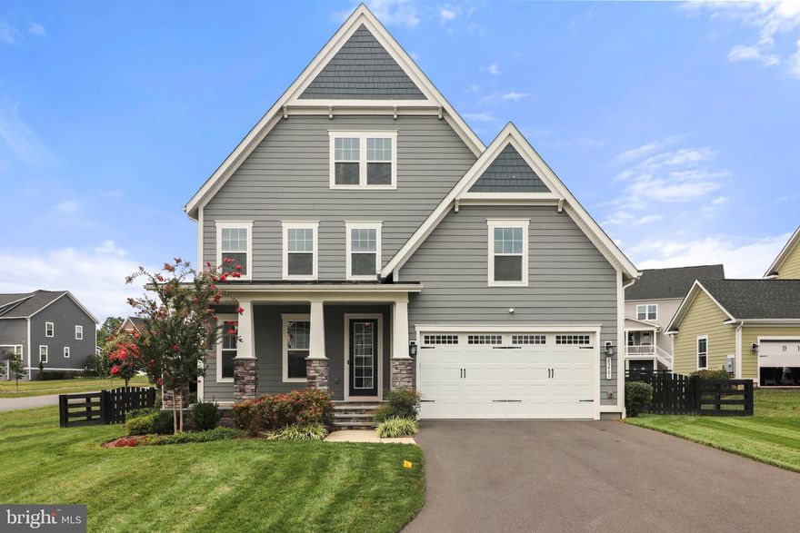 *** VA Assumable Loan with Freedom Mortgage at 3.5% is available to anyone*** 

WELCOME to 23401 Swamp Maple Lane! This home is back on the market and is priced to sell!  This stunning 4-bedroom, 4.5-bathroom NV home offers nearly 5,000 sq. ft. of finished living space in the highly sought-after Grant at Willowsford community. Designed with both elegance and functionality in mind, this craftsman-style home boasts exceptional upgrades and an entertainer’s dream layout.

Step onto the charming covered front porch before entering a spacious main level featuring a formal dining room, a dedicated study, and a bright, open-concept living area. The gourmet kitchen is a showstopper, complete with stainless steel appliances, expansive quartz countertops, a breakfast café, and wide-plank engineered hardwood floors that extend throughout the main level.

For those who love to entertain, the backyard is a true oasis! The recently renovated (2023) flagstone patio features a large gazebo, a built-in natural gas grill, a sink, and a custom firepit—perfect for hosting gatherings year-round.

Upstairs, the luxurious primary suite offers tray ceilings, an oversized spa-like bathroom, and two large walk-in closets. Three additional bedrooms complete the upper level—one with an ensuite bath, while the other two share a Jack-and-Jill bathroom.

The 1,600 sq. ft. finished basement is a showpiece of its own, designed for ultimate entertainment. It includes a custom-built media space with a 5.1 surround sound system, a stylish wet bar, luxury vinyl plank flooring throughout, a full bathroom, and an oversized storage room currently used as a home gym. Additional upgrades include a smart thermostat system, an irrigation system, and a home security system.

Living in Willowsford means enjoying top-tier amenities, including a clubhouse, fitness center, lakes, fishing ponds, a splash park, community pools, walking trails, and more. Conveniently located on the Ashburn side of Route 50, this home provides easy access to Dulles Airport, wineries, shopping, major commuter routes, and more.

Don’t miss this incredible opportunity to own a home designed for luxury, comfort, and entertainment!