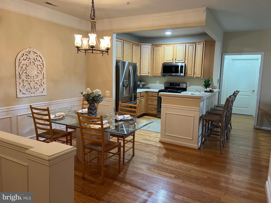 Discover comfort, convenience, and charm in this beautifully maintained 2-bedroom, 2-bathroom condo with a versatile den, located in one of the area's most desirable neighborhoods.
This light-filled home features an open-concept layout, perfect for modern living. The kitchen includes stainless steel appliances, and plenty of cabinet space, flowing seamlessly into the spacious living and dining areas—ideal for both everyday living and entertaining.
The primary suite offers a private en-suite bathroom, while the second bedroom and additional full bath provide flexible options for guests or family. The den is perfect for a home office, reading nook, or creative space.
Enjoy the convenience of elevator access, secure building entry, and ample parking. Best of all, you’re just a short walk to the scenic Ma and Pa Trail—perfect for morning jogs, leisurely walks, or biking through nature.
Located near shops, dining, and major commuter routes, this condo blends lifestyle and location effortlessly.