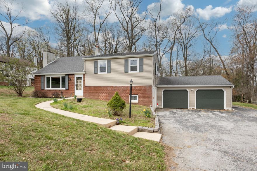 Situated in West Bradford Township and served by the award-winning Downingtown School District, including the prestigious Downingtown STEM Academy, this 4-bedroom, 2-bath home sits on a level 0.45-acre lot. Inside, much of the home has been freshly painted, creating a bright and welcoming feel. The living room features hardwood floors, a large picture window, and a propane fireplace (propane tank required). The formal dining room includes wainscoting, crown molding, ceiling fan and hardwood flooring, ideal for hosting guests. The updated kitchen offers granite countertops, a tile backsplash, smooth top range, overhead microwave, and stainless steel dishwasher. It flows into the breakfast room and sunroom, which provides slider access to the rear 20'x20' deck and backyard—perfect for relaxing or entertaining. Upstairs on the second floor, you’ll find three generously sized bedrooms, hall linen closet and a beautifully renovated hall bath with tiled shower/tub combination. The third floor features the fourth bedroom, complete with a closet and access to a floored attic—perfect for extra storage. The lower level includes a laundry area with washer and dryer, a large mudroom with access to the 2-car garage, a full tiled bath with shower, and a spacious family room with walkout access to the driveway. This home offers a peaceful country setting, yet it's conveniently located close to major routes such as Route 30, as well as shopping, dining, and everyday amenities—providing the best of both worlds.
