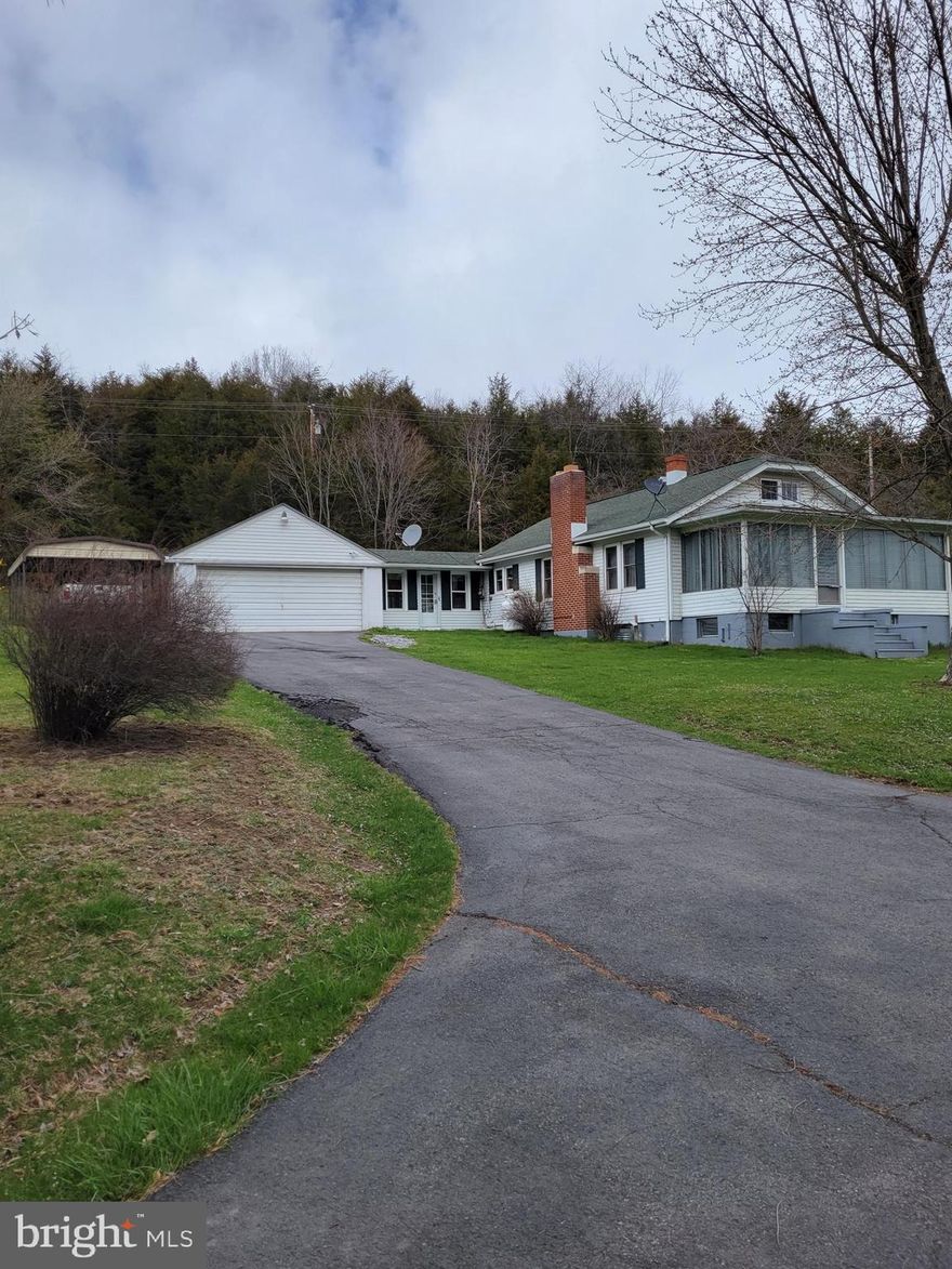 This expansive 8.86-acre property provides ample space for various potential uses, whether you're looking for a serene rural retreat or have a vision for commercial opportunities.
With direct frontage along Route 50, your property benefits from high visibility and accessibility, making it an attractive option for businesses, investors, perfect for an apartment building or anyone seeking convenient access to transportation routes.
Enjoy the convenience and cost savings of having access to both public water and sewer systems. This property has a well and septic, too.
The property features a barn, which can serve a variety of purposes, such as storage, a workshop, or housing for livestock.
The included home has been thoughtfully updated, offering modern amenities and a comfortable living space.
This charming home is not only a comfortable haven but also a practical space for your vehicle needs. It offers the perfect blend of convenience and functionality with its attached 2-car garage and detached 1-car carport.
This unique property offers an incredible opportunity for those seeking a versatile and well-maintained space with limitless potential. Whether you're looking to build a dream home, start a business, or simply enjoy the tranquility of rural life with the convenience of modern utilities, this property has it all.