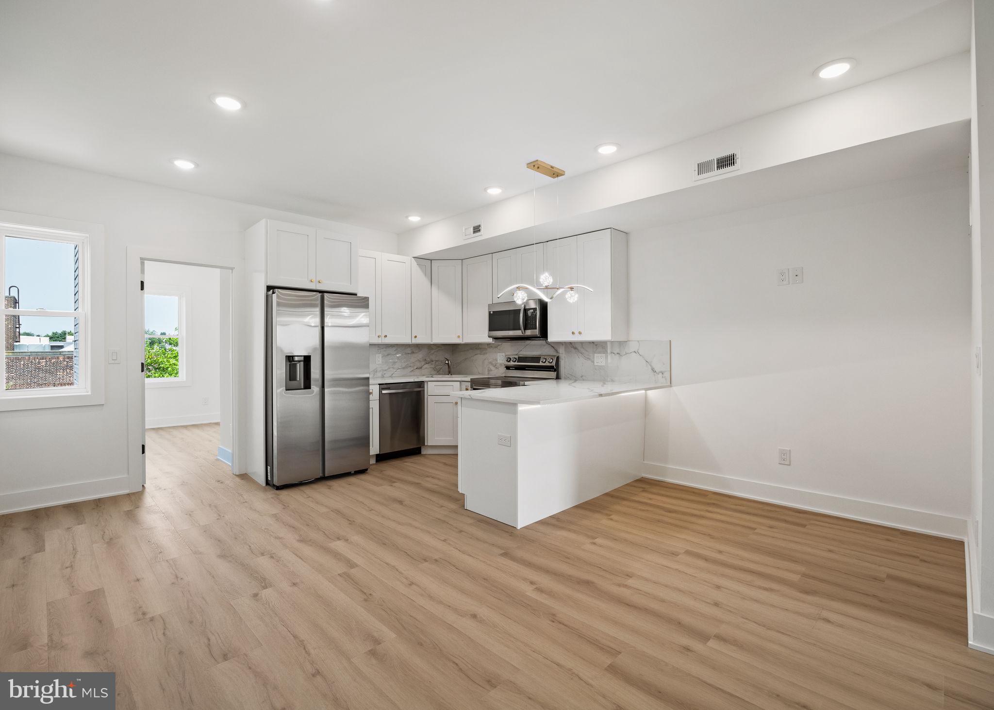 Brand new 2 bedroom 1 bath apartment with access to shared roof deck. This unit is on the 2nd floor of this brand new construction triplex building, located in the Norris Square neighborhood you will be just a block to Norris Square park and only a few blocks to Fishtown, Frankford Ave and the Dauphin/York St subway stop. This apartment has two generous sized bedrooms on opposite sides of the unit for maximum privacy, a full sized stacked washer and dryer, kitchen/ living room combo. The gorgoeus kitchen is finished with quartz countertops with countertop seating, stainless steel appliances, and soft close cabinest with gold hardware. You will have access to the extra large roof deck for your enjoyment. Simple application process, $39 application fee, $75 flat fee for water usage, and tenant pays eletcric.