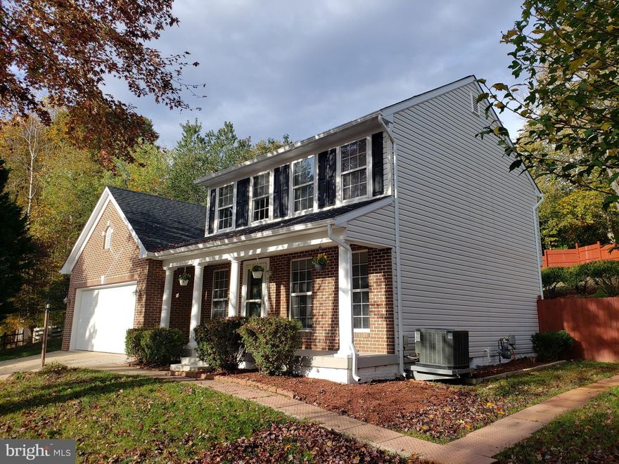 This is the home you have been dreaming about! Complete renovation from top to bottom, everything is brand spanking new including the architectural roof! The entire home has been freshly painted---yes, all the walls including the basement! Upon entry, this home includes hard wood floors in all rooms on the main level, neutral carpeting in bedrooms and basement, bright white cabinets with gorgeous white/gray quartz counter-tops matched through-out the entire house! The modern kitchen includes brand new LG SS appliances,  an island cabinet and trendy overhead light fixtures. The room extends into the large family room with new gas fireplace, mantle and new slider patio doors to the massive decorative cement stamped patio, (1300 sf) where there is ample space to have huge outdoor parties, Barbeques and family functions! This is a one-of-a- kind patio space for entertaining! You do not want to miss this! All bathrooms have new toilets and modern stainless steel, high end fixtures. The primary bathroom includes dual new sinks, door-less shower and a cozy new white soaking tub, where you can relax and destress! Laundry room is located on main level with huge capacity top loading washer. New HVAC system, hot water heater in the fully finished basement, along with a large bedroom, full bath with a beautiful patterned tile up to the ceiling with frameless shower doors and a large recreation area with a walk-up basement exit. Make an offer! You cannot buy new construction in this area for such a great price! Come take a look! This spectacular property is tucked away on a quiet pipe stem road off the main drive of Pearsons Landing! Only one way in and one way out of this sought-after community! This gorgeous home backs up to woods with mature and flowering trees. Garage is finished and painted. Conveniently located for commuting to Washington D.C., Quantico MCB, Fort Belvoir and The Pentagon. Close to I95, VRE, shops, restaurants, parks and recreation facilities.