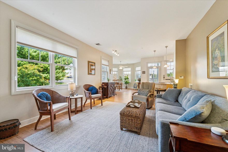 Serenity, privacy, and luxury await you in this beautifully renovated 1 bedroom 2 bath corner unit in the Villages at Pine Valley. Only 4 units with this rarely offered floor plan are found in the scenic 55+ active adult community.  An expansive 1,118 sq ft greets you in this freshly painted, end unit condo, where you can enjoy one floor living at its best!  Host friends and family in the open living area with 9 ft ceilings, all new premium LVP flooring, a cozy fireplace, and new cellular custom blinds on high-end Andersen windows. Natural light is abundant throughout, with  views of pine and flowering trees. The uplifting sunroom with ceiling fan can also serve as an office, dining area, or playroom for grandkids! The kitchen offers light oak cabinetry, an extra deep sink with overlooking window, tiled backsplash, and stainless steel appliances, including a 5-burner stove and new double door refrigerator. A covered balcony awards views of the community's sprawling acreage. The spacious primary suite has new carpet with premium padding, ceiling fan, and a walk-in closet. An additional walk-in coat closet and walk-in pantry in the hallway give this unit incredible storage options! In the 2nd bathroom, a new  stackable W/D and hanging area are found, along with new hardware and lighting. Elevator access to your designated parking space in a well-lit garage, and additional parking in front of the building, are a real advantage. 

And that's just the beginning!  An impressive clubhouse hosts a year-round heated pool, well equipped workout room, art room and library, billiard room, a large party room with kitchen, plus regular yoga classes and special activities. 

Nearby Fox Chase Farm and Pennypack Park make this community a recreational retreat, with main street Huntingdon Valley and Bryn Athyn campus and cathedral just a few minutes away. Don't miss this chance for  elegant maintenance-free living!

DIRECTIONS: When you enter via Susquehanna or Pine Rd,  inch up to the GATES, THEY WILL OPEN UP AUTOMATICALLY. Or Enter via Veree St. Proceed to Tyler Ct.