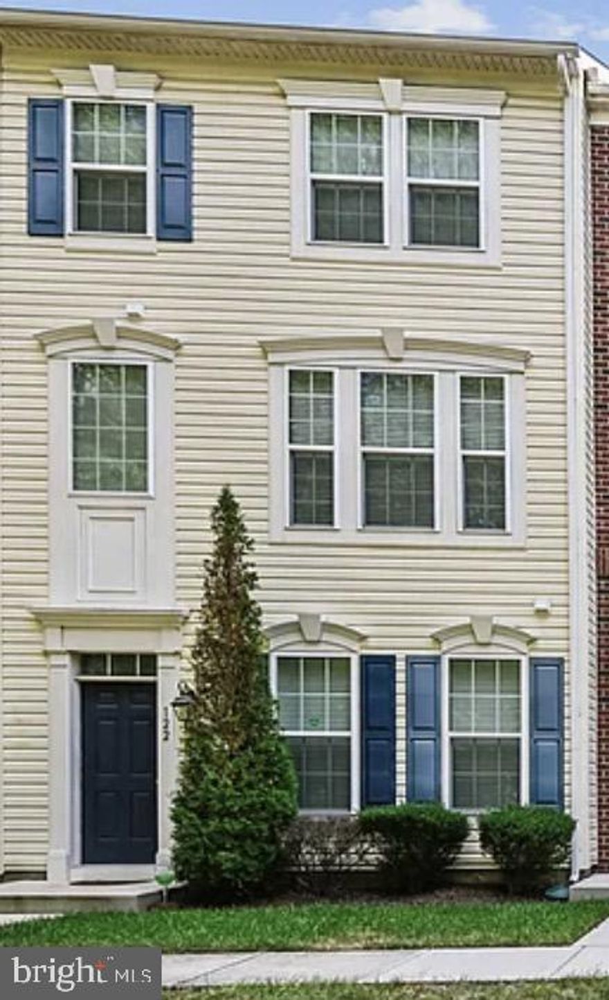 Welcome to 122 Kindred Way! Tucked quietly towards the rear of the neighborhood, this home offers extra privacy with its tree-lined frontage and a convenient two-car rear entry garage. This immaculate home is move in ready and will not last long!  Step inside to a welcoming foyer that opens to a very cozy family room area with a half bath attached. This space is also ideal for an dedicated workspace. The main level shines with hardwood flooring and stainless steel appliances. The gourmet kitchen boasts granite countertops and an oversized island, ideal for gatherings.  This floor seamlessly flows to the open-concept living room and discreetly placed half bath which completes the space. Upstairs, the primary suite offers crown molding, a generous walk-in closet, and abundant natural lighting. The beautiful master bath features a double vanity, a stand-alone shower, and a private toilet area. Two additional bedrooms, one with its own walk-in closet, share the hall bath and the convenience of upper-level laundry making daily living easier.  In addition to this immaculate home, you will have easy access to Routes 100, 97, and 695, putting you just minutes from shopping, dining, and major commuter routes. This MOVE IN READY beauty will not last long!