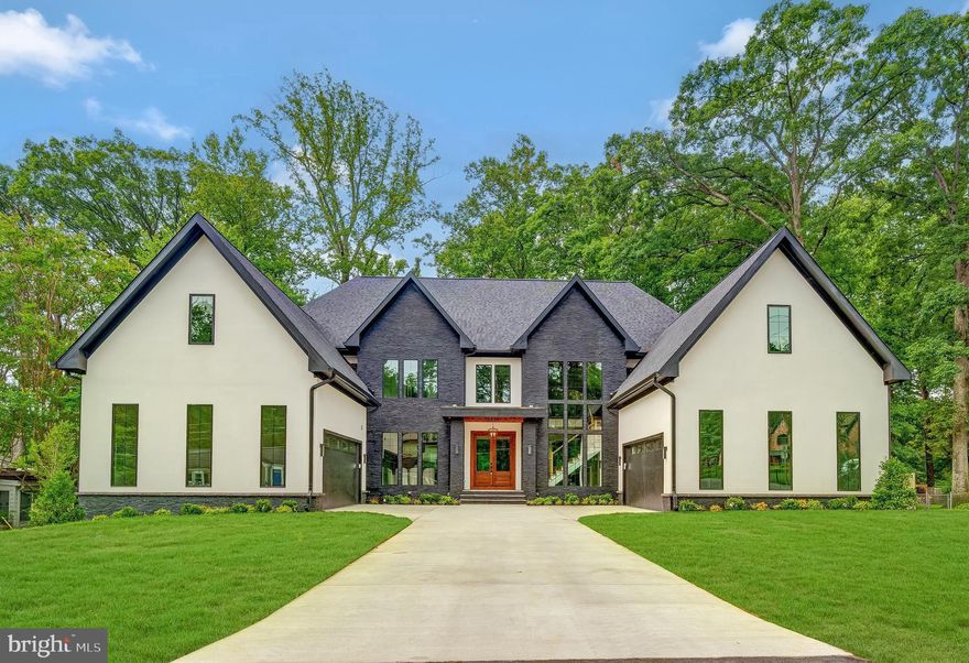 Modern and Warm, LUKA Design & Build's latest project at 8539 Aponi is nothing short of spectacular. From the moment you walk in, you know you are in the midst of impeccable taste and style.  Every fixture, every finish is bespoke and curated beautifully. The clean lined architecture is highlighted and complemented by the warm textures and finishes.  This home sits on a half acre boasting 8,099 square feet, 3 levels, 6 bedrooms, 6 full bathrooms, and 2 half bathrooms.  Journey through each and every room and around each corner to discover something surprising and thoughtfully designed.  

Wall to wall windows frame a serene view of the outdoors, offering year-round tranquility and a seamless connection to nature. Whether bathed in sunlight or dusted with snow, the outdoors will invite a sense of calm that’s richly deserved. Flowing effortlessly with the kitchen, foyer, and dining area, this living space keeps you connected at every turn. Anchoring the room is a peek-through gas fireplace creating a striking focal point, blending modern craftsmanship with cozy charm.

A “Chef’s Dream Kitchen”... it marries high-end function with timeless elegance. Outfitted with premier Sub-Zero® and Wolf® appliances, it’s a culinary stage built for both everyday meals and gourmet pursuits. Two expansive islands, generously sized, invite guests to gather while allowing ample room for prep and presentation. Innovative lighting casts a warm, layered glow across the entire room. Every detail is tailored for sophistication and efficiency, creating a space that is as visually stunning as it is expertly equipped.   
Elegantly entertain at the heart of the home. The dining space offers seamless integration with the casual living room and chef’s kitchen. This open layout is designed for effortless connection and flow. Well proportioned for both intimate dinners and lively gatherings, this area exudes understated luxury. Backlit built-in shelves frame the space and will cast a soft glow on curated decor and personal treasures, adding a touch of artistry and warmth. 

A restorative retreat from the demands of daily life, this primary bedroom exudes a sense of peace and quiet grace.  A soft, neutral palette invites relaxation, while gentle natural light filters through well-placed windows, creating a tranquil atmosphere from morning to evening. Just steps away, relax in the seating area with a built-in desk, and enjoy a beautiful view of the outdoors.

Masterfully designed, the primary bathroom evokes the essence of a five-star retreat, where every detail is an invitation to unwind. Twin vanities, perfectly balanced and accented with artisanal fixtures, offer individualized spaces for daily rituals under ambient light. Relax in the free standing bathtub or under the rain shower. Refined yet soothing, the space is a beautiful pairing of exquisite taste and function.

Beneath the main level lies the perfect space for entertainment.  It is anchored by a stadium-style theatre room with tiered floors and cinematic lighting.  Just steps away is a stylish entertainer’s area, complete with wet bar and wine refrigerator, room to serve cocktails or food as well as a second bar for seating. Also on this level, a guest bedroom with en-suite bathroom offering privacy and comfort, a powder room, and an additional bonus room to use for fitness, office space, additional guests, etc. The possibilities are boundless on this level.