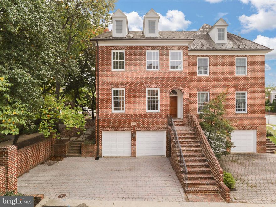 Urban Sophistication Meets Timeless Style in Downtown McLean
Tucked away in an exclusive enclave just moments from downtown McLean, this stately all-brick four-level townhome has been completely reimagined from top to bottom. SO MUCH is BRAND NEW! Every detail reflects quality and craftsmanship — from the new hardwood flooring and designer lighting to the open-concept main level that feels both elegant and inviting.

The brand-new gourmet kitchen features a center island, stainless steel appliances, and sleek cabinetry, opening seamlessly to a cozy sitting area with a fireplace — perfect for entertaining or everyday comfort.

Upstairs, the primary suite offers a walk-in closet, a second fireplace, and a spa-inspired bath, joined by two additional bedrooms and a stylish new full bath. The top-level loft is a bright and versatile retreat with its own full bath, ideal for a guest suite, office, or creative studio.

The walkout lower level includes yet another fireplace and access to a private brick courtyard, providing the perfect indoor-outdoor flow, along with convenient entry to the attached two-car garage. And for the ultimate in convenience, the private elevator services all four levels.

This is urban living at its most refined — in a serene setting, with quick access to shops, dining, and all that McLean has to offer. This tucked away complex is close to Georgetown, downtown DC, Reagan and Dulles International airports. Easy access to all the attractions of the area.